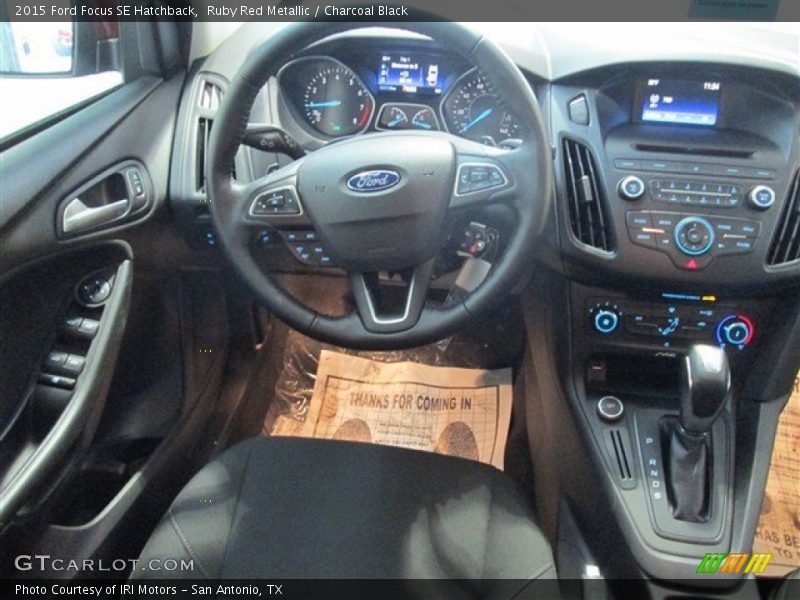 Ruby Red Metallic / Charcoal Black 2015 Ford Focus SE Hatchback