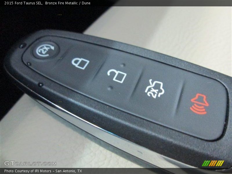 Bronze Fire Metallic / Dune 2015 Ford Taurus SEL