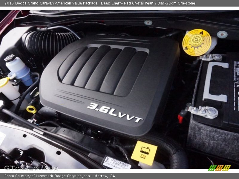 Deep Cherry Red Crystal Pearl / Black/Light Graystone 2015 Dodge Grand Caravan American Value Package