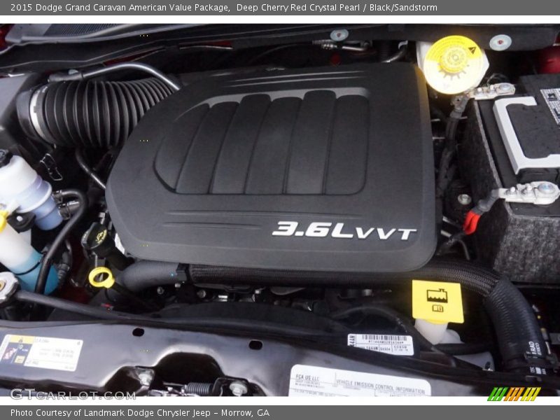 Deep Cherry Red Crystal Pearl / Black/Sandstorm 2015 Dodge Grand Caravan American Value Package