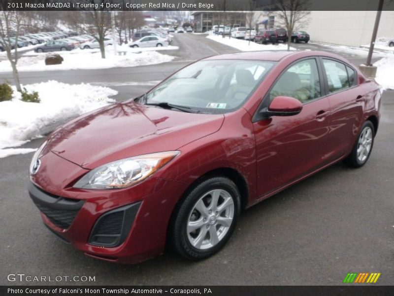 Front 3/4 View of 2011 MAZDA3 i Touring 4 Door