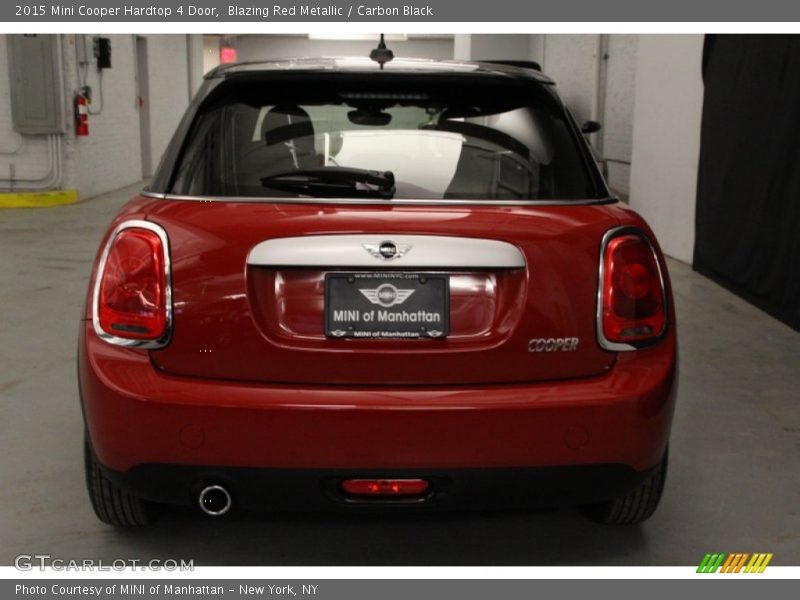 Blazing Red Metallic / Carbon Black 2015 Mini Cooper Hardtop 4 Door