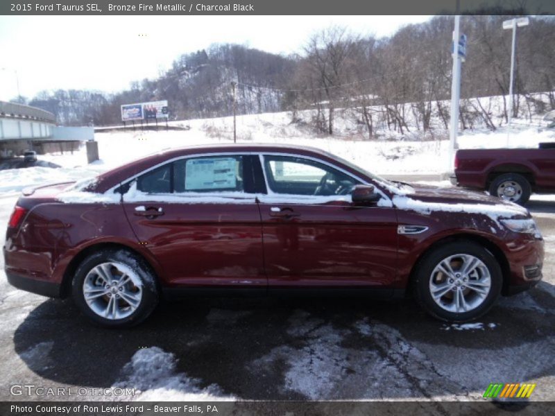 Bronze Fire Metallic / Charcoal Black 2015 Ford Taurus SEL