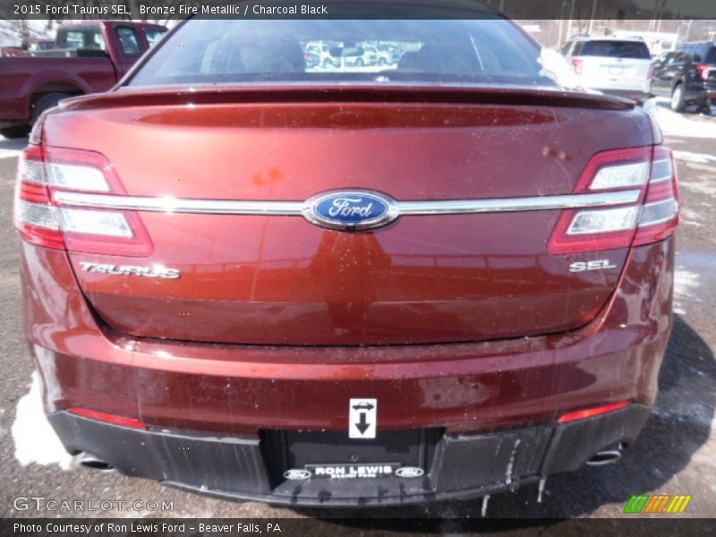 Bronze Fire Metallic / Charcoal Black 2015 Ford Taurus SEL