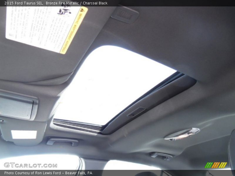 Bronze Fire Metallic / Charcoal Black 2015 Ford Taurus SEL