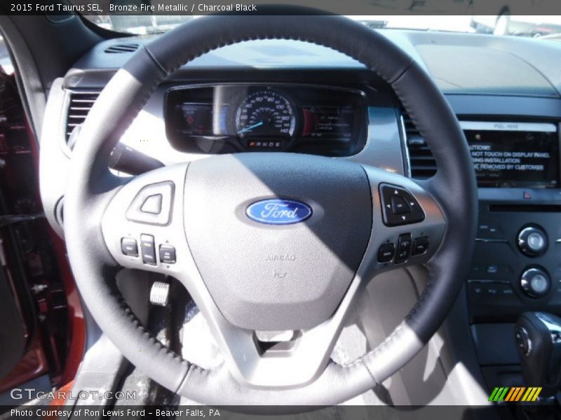 Bronze Fire Metallic / Charcoal Black 2015 Ford Taurus SEL