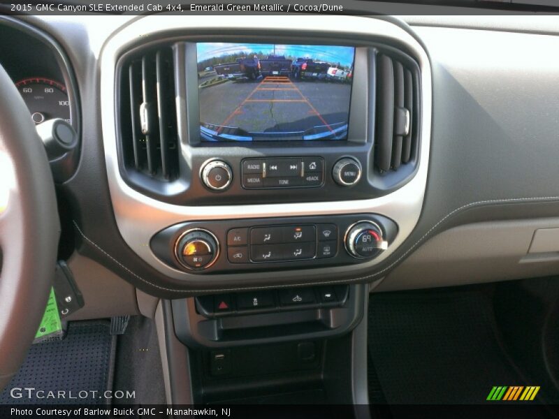 Emerald Green Metallic / Cocoa/Dune 2015 GMC Canyon SLE Extended Cab 4x4