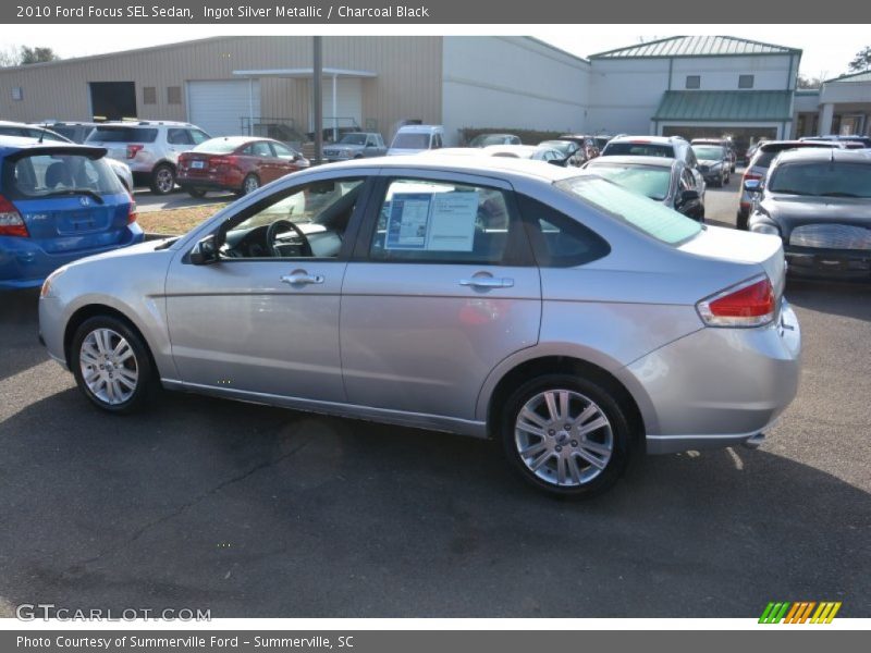 Ingot Silver Metallic / Charcoal Black 2010 Ford Focus SEL Sedan