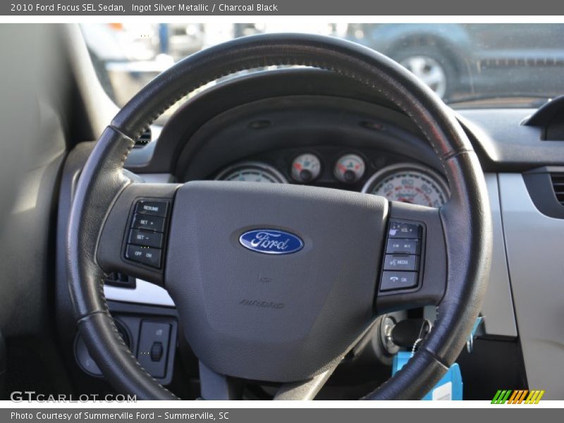 Ingot Silver Metallic / Charcoal Black 2010 Ford Focus SEL Sedan
