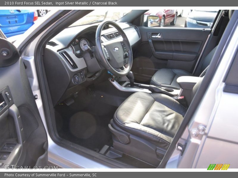 Ingot Silver Metallic / Charcoal Black 2010 Ford Focus SEL Sedan