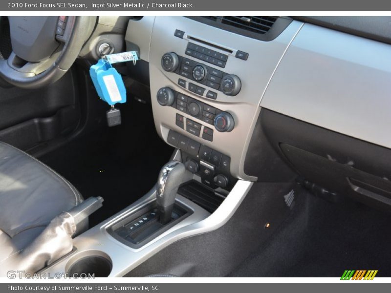Ingot Silver Metallic / Charcoal Black 2010 Ford Focus SEL Sedan