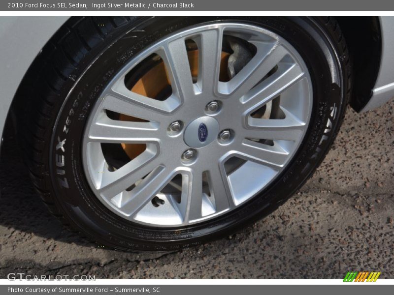 Ingot Silver Metallic / Charcoal Black 2010 Ford Focus SEL Sedan