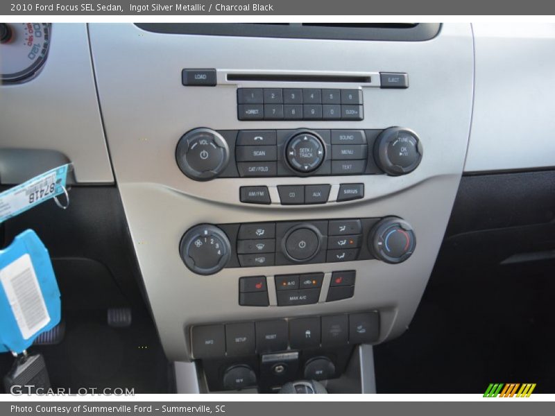 Ingot Silver Metallic / Charcoal Black 2010 Ford Focus SEL Sedan