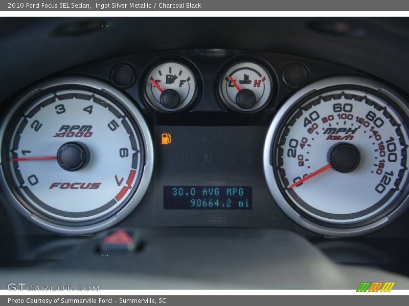 Ingot Silver Metallic / Charcoal Black 2010 Ford Focus SEL Sedan