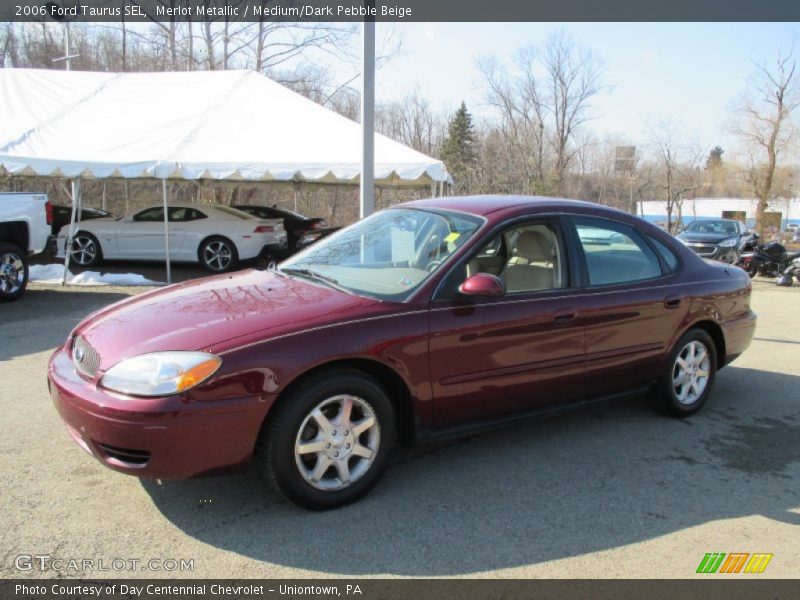 Merlot Metallic / Medium/Dark Pebble Beige 2006 Ford Taurus SEL