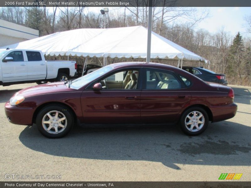 Merlot Metallic / Medium/Dark Pebble Beige 2006 Ford Taurus SEL