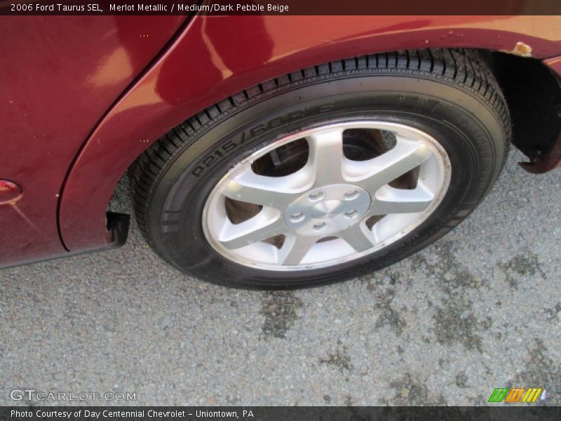 Merlot Metallic / Medium/Dark Pebble Beige 2006 Ford Taurus SEL