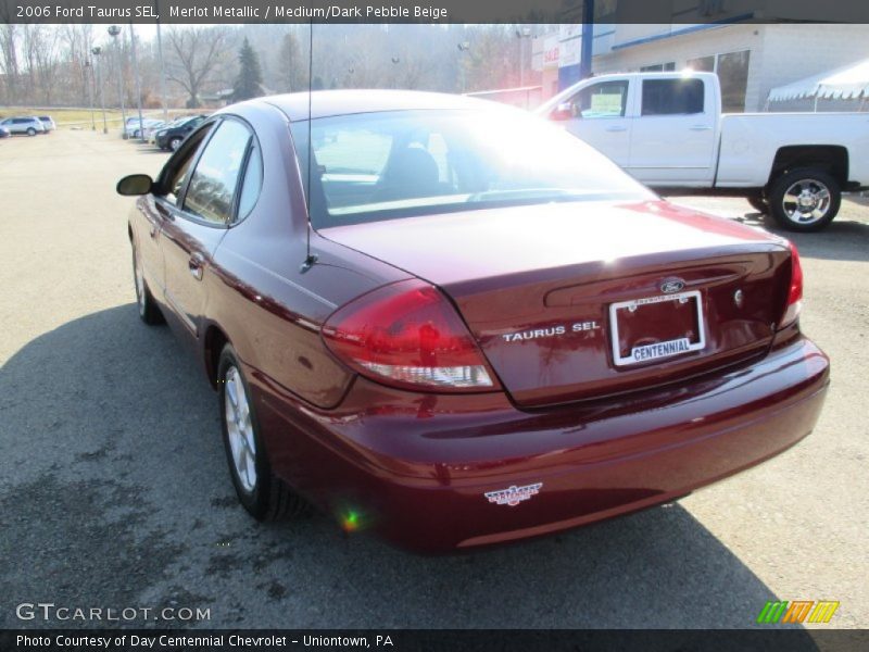 Merlot Metallic / Medium/Dark Pebble Beige 2006 Ford Taurus SEL