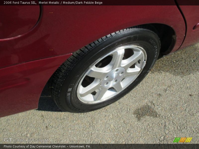 Merlot Metallic / Medium/Dark Pebble Beige 2006 Ford Taurus SEL
