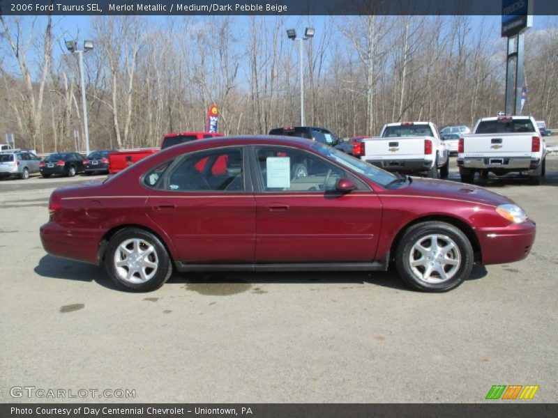 Merlot Metallic / Medium/Dark Pebble Beige 2006 Ford Taurus SEL