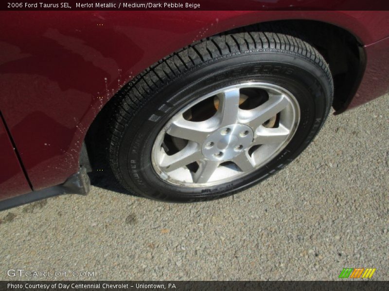 Merlot Metallic / Medium/Dark Pebble Beige 2006 Ford Taurus SEL