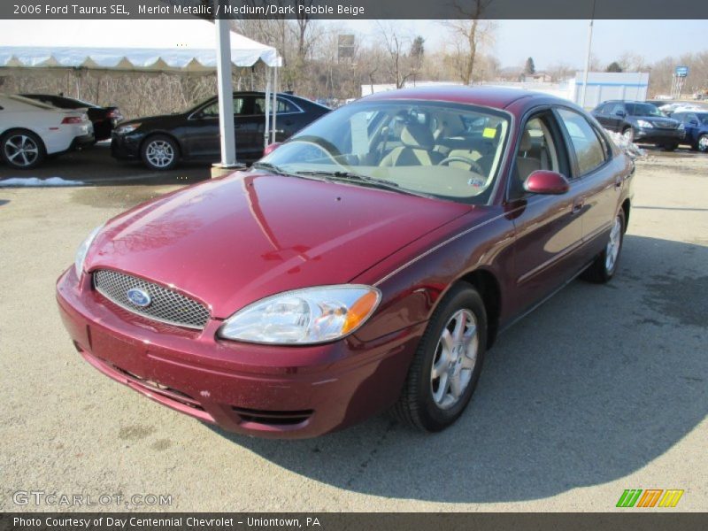Merlot Metallic / Medium/Dark Pebble Beige 2006 Ford Taurus SEL