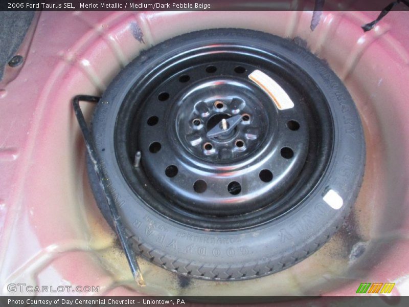 Merlot Metallic / Medium/Dark Pebble Beige 2006 Ford Taurus SEL