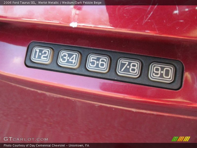 Merlot Metallic / Medium/Dark Pebble Beige 2006 Ford Taurus SEL