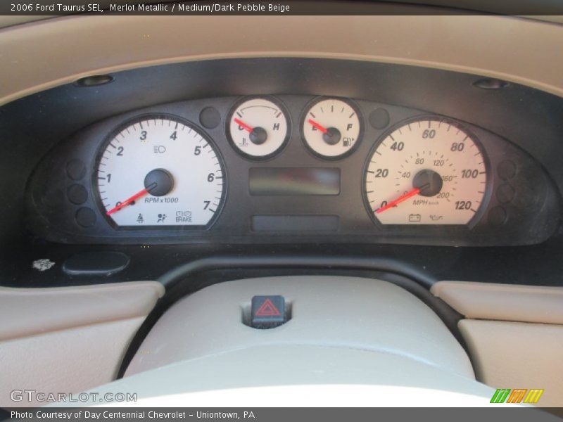 Merlot Metallic / Medium/Dark Pebble Beige 2006 Ford Taurus SEL