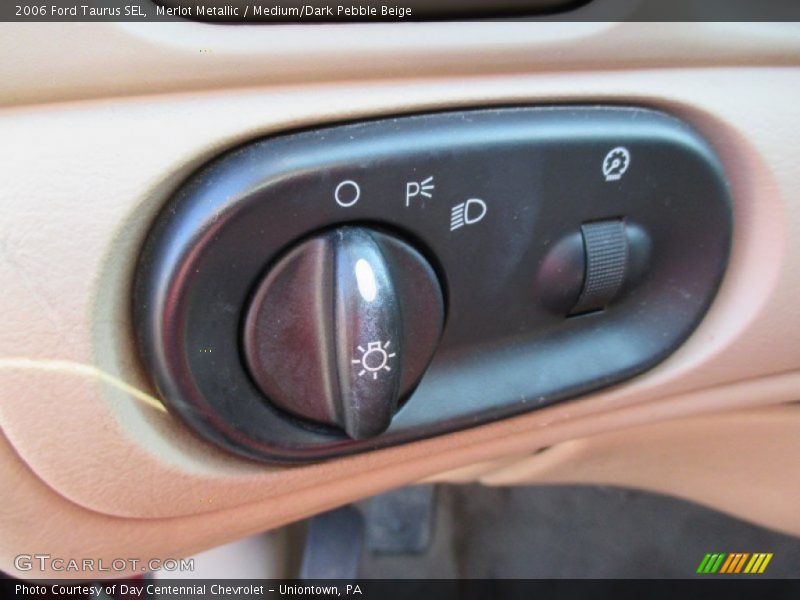 Merlot Metallic / Medium/Dark Pebble Beige 2006 Ford Taurus SEL