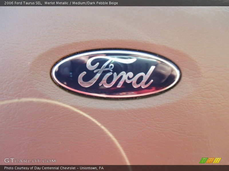 Merlot Metallic / Medium/Dark Pebble Beige 2006 Ford Taurus SEL