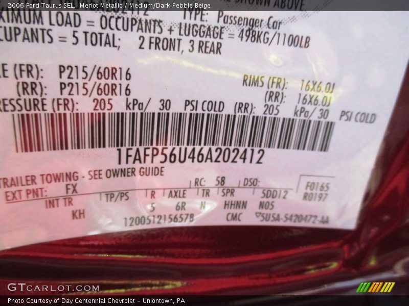 Merlot Metallic / Medium/Dark Pebble Beige 2006 Ford Taurus SEL