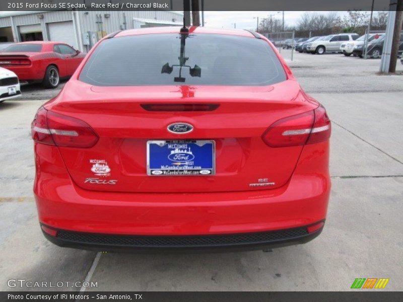 Race Red / Charcoal Black 2015 Ford Focus SE Sedan