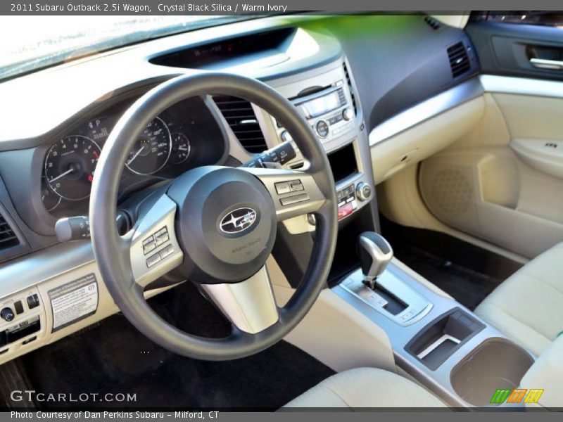 Crystal Black Silica / Warm Ivory 2011 Subaru Outback 2.5i Wagon