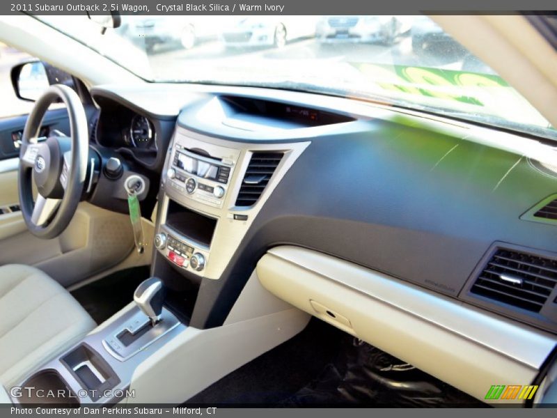 Crystal Black Silica / Warm Ivory 2011 Subaru Outback 2.5i Wagon