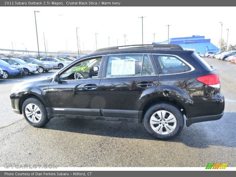 Crystal Black Silica / Warm Ivory 2011 Subaru Outback 2.5i Wagon