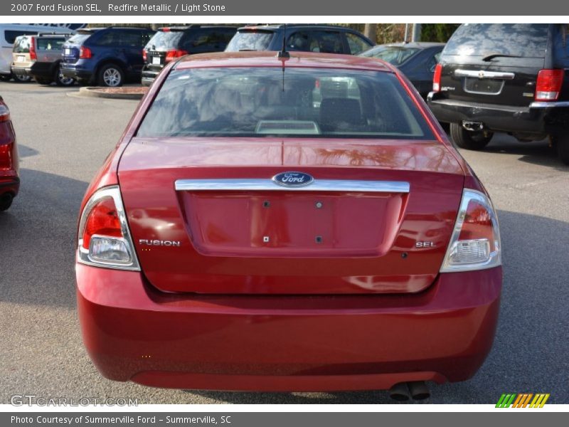 Redfire Metallic / Light Stone 2007 Ford Fusion SEL