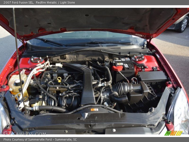 Redfire Metallic / Light Stone 2007 Ford Fusion SEL