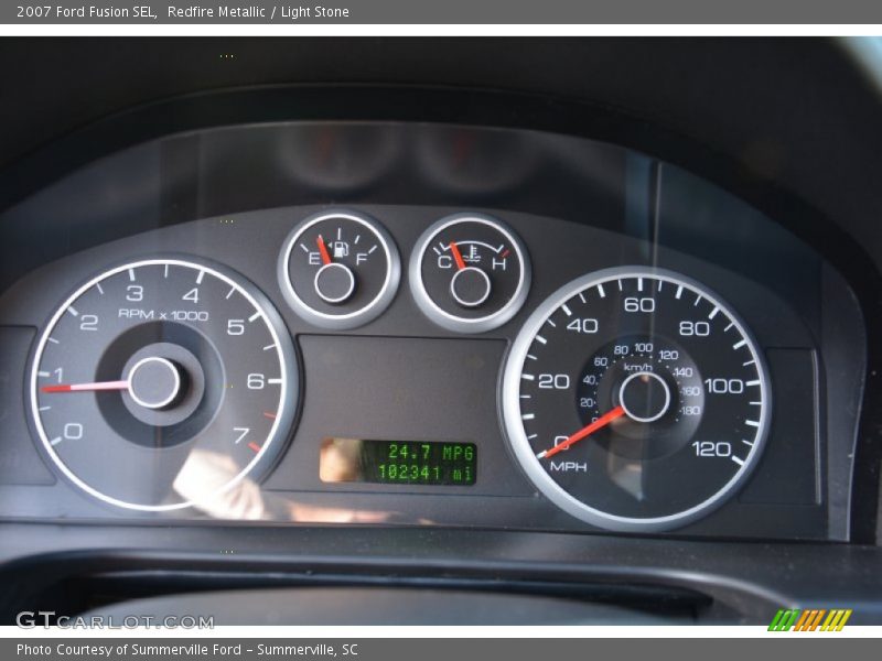 Redfire Metallic / Light Stone 2007 Ford Fusion SEL