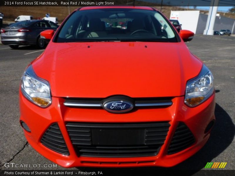 Race Red / Medium Light Stone 2014 Ford Focus SE Hatchback