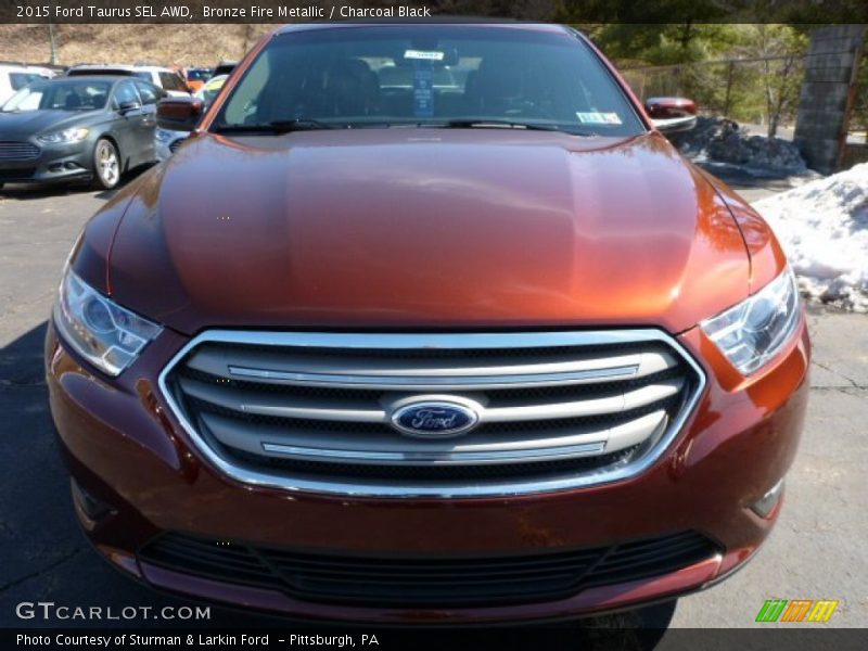 Bronze Fire Metallic / Charcoal Black 2015 Ford Taurus SEL AWD