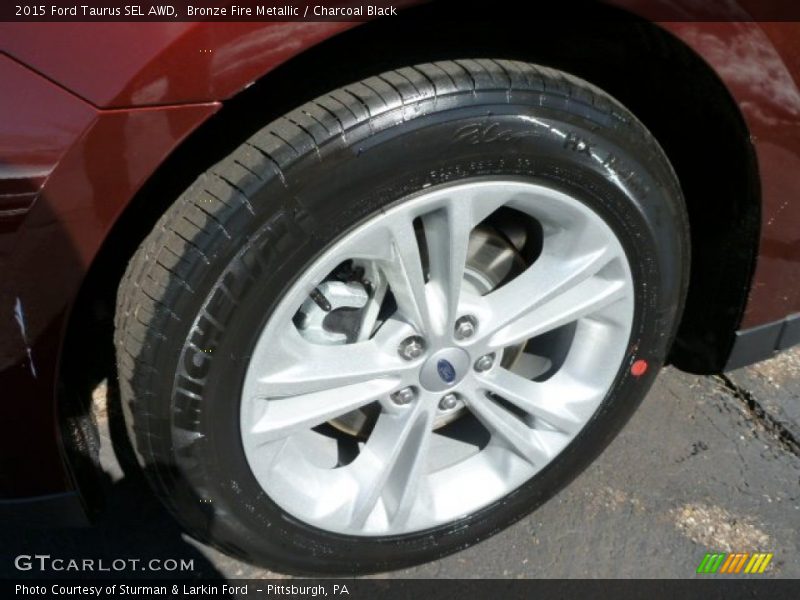 Bronze Fire Metallic / Charcoal Black 2015 Ford Taurus SEL AWD