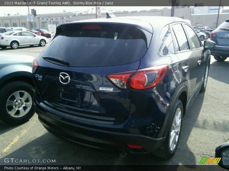 Stormy Blue Mica / Sand 2013 Mazda CX-5 Grand Touring AWD
