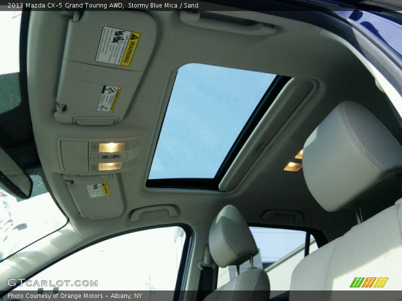 Stormy Blue Mica / Sand 2013 Mazda CX-5 Grand Touring AWD