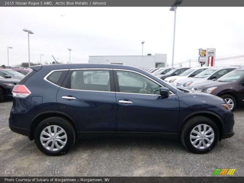 Arctic Blue Metallic / Almond 2015 Nissan Rogue S AWD