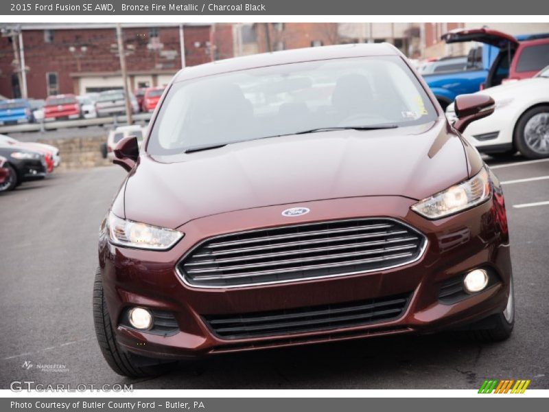 Bronze Fire Metallic / Charcoal Black 2015 Ford Fusion SE AWD