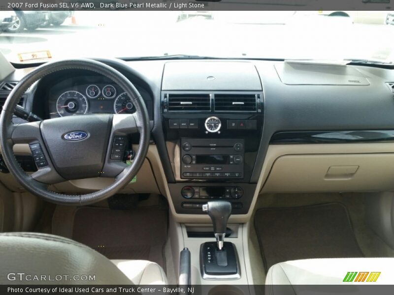 Dark Blue Pearl Metallic / Light Stone 2007 Ford Fusion SEL V6 AWD