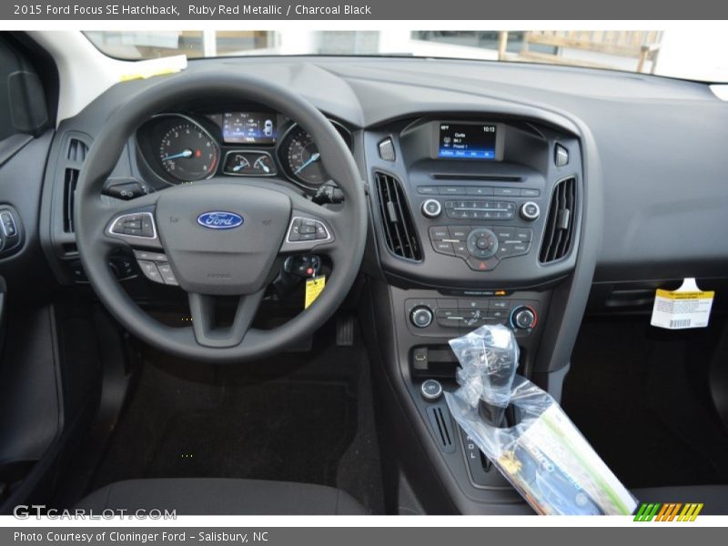 Ruby Red Metallic / Charcoal Black 2015 Ford Focus SE Hatchback