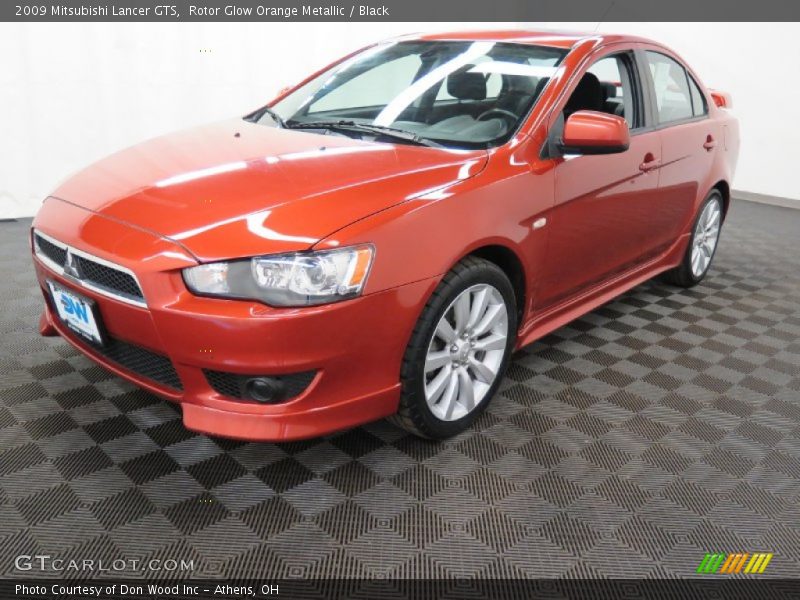 Rotor Glow Orange Metallic / Black 2009 Mitsubishi Lancer GTS