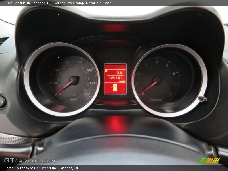 Rotor Glow Orange Metallic / Black 2009 Mitsubishi Lancer GTS